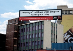 Jumping off buildings when pregnant harms your baby. You woudn't ignore this warning. Why ignore them on cigarette packs? | © www.bestdesignoptions.com
